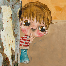 Boy hiding behind tree